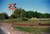 Het raccordement en de overweg van Yara in Norrköping bij de Kommendantvägen in mei 2000. The siding of Yara, seen from the railroad crossing in Norrköping (Kommendantvägen) in May 2000.