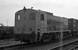 In 1983 rangeert de radioloc NS 2260 met een containertrein met de (toen) welbekende BELL containers over het Botlek emplacement. In 1983 the diesel engine NS 2260 is shunting with a container train on the Botlek yard in the Rotterdam harbour.