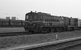 In 1983 staan de bruine NS 2263 (radioloc) en geel grijze 2520 opgesteld in de Botlek.  In 1983 two diesel engines from the NS, nr 2263 (brown) and nr 2520 (yellow grey) are standing on the yard in the Botlek area (Rotterdam)