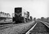 In 1958 staat de 2340 in Winterswijk klaar voor vertrek met een goederentrein.
Beeldmateriaal Het Utrechts Archief Nr. 155403 In 1958 the brown diesel locomotive NS 2340 is ready for departure in Winterswijk with a freight train.
Image from Het Utrechts Archief Nr. 155403