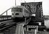 Een geel grijze DEII rijdt over de spoorbrug over de IJssel bij Zutphen. 
Rond 1980.
Beeldmateriaal Het Utrechts Archief Nr. 168679 A diesel train unit (NS DEII) is passing the bridge over the IJssel at Zutphen. 
Around 1980.
Image from Het Utrechts Archief Nr. 168679