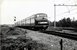 Een onbekende Plan U van de NS rijdt op een nog onbekende splitsing in Nederland.
Rond 1960.
Beeldmateriaal Het Utrechts Archief Nr. 806715 A unknown diesel train unit (Type Plan U) from the NS is driving on a unknown location in The Netherlands.
Around 1960. 
Image from Het Utrechts Archief Nr. 806715