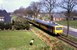 Twee Wadloper stellen (DH2 3212 en onbekend) rijden op koninginnedag (30-4-1985) van Groningen naar Drachten langs de Paterswoldseweg tijdens een rondit van de NVBS.
 Two diesel train units (Wadlopers DH2, the first one is nr 3212) from the NS are driving between Groningen and Drachten next to the Paterswoldseweg. 
They are making a round trip for the NVBS.
30-4-1985