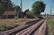 Op 5-8-1975 komt een Y7 dieselstel van de SJ aan bij de kleine halte van Ingribyn op weg naar het zuiden over de DVVJ richting Mellerud. On 5-8-1975 a diesel train unit type Y7 from the SJ arrives at the small stop of Ingribyn on the DVVJ on its way south to Mellerud.