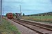 Op 1-8-1975 rijdt een Z64 rangeerloc van de SJ voorbij in Söpple onderweg naar het zuiden over de DVVJ. On 1-8-1975 a diesel shunting engine from the SJ is passing Söpple on its way south over the DVVJ.