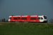 Op 26-4-2007 rijdt een Spurt stel (306) van Arriva uit Delfzijl of Roodeschool richting Groningen. 
Om 16:30 passeert ze bijna de brug over het Van Starkenborghkanaal. On 26-4-2007 a diesel train unit from Arriva (Spurt 306 ) are on their way from Delfzijl or Roodeschool to Groningen. At 16:30 it is about to cross the Van Starkenborghkanaal. 