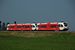 Op 26 april 2007 rijden twee spurt treinen van Arriva tussen Delfzijl en Groningen, vlak voor de brug over het Van Starkenborghkanaal. 15:59 On 26-04-2007 two Spurt diesel rail units from Arriva are driving between Delfzijl and Groningen. At 15:59 they are about to pass the bridge over the 