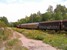 We zijn weer in Billingsfors waar de rode T44 nr 373 druk in de weer is met de wagons met papierpulp voor Rexcell in Skåpafors.
Op de losweg is het lossen van de wagons in volle gang en we zien hoe de blauwe Scania van Västfrakt vertrekt richting Rexcell. 

Dit was (voorlopig) ons laatste bezoek aan het mooie station van Billingsfors, waar we met veel plezier de rangeerbewegingen hebben gadegeslagen.

10-8-2006 11:10 We are in Billingsfors where the red T44 373 has arrived from Göteborg with wagons loaded with paper - pulp for Rexcell in Skåpafors and is pulling the wagons from the loading area to change them for new ones. 

When the shunting was ready, the unloading of the wagons began. The blue Scania Västfrakt truck was being loaded with some paper product by a 