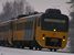 Op 2-3-2005 rijden twee NoordNed Wadlopers (Nr 3117 en 3221) Groningen binnen na een rit uit Delfzijl of Roodeschool.
16:35 Nearing the end of their trip from Delfzijl or Roodeschool, two diesel railcars (NoordNed Wadloper 3117 and 3221) have almost arrived in Groningen. 
3-2-2005 16:35