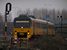 Op 18-3-2005 komen twee Wadlopers van NoordNed (DH2 3206 en DH1 3117) voorbij op weg van Delfzijl of Roodeschool naar Groningen. 
13:41 On 18-3-2005 two diesel train units from NoordNed are on their way from Delfzijl or Roodeschool to Groningen. 
13:41