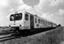 In 1982 staat een nieuwe wadloper van de NS vlak bij Sauwerd. 
Beeldmateriaal Het Utrechts Archief Nr. 151210 In 1982 a new diesel train unit (DH2 Wadloper 3211) from NS is standing close to Sauwerd. 
Image from Het Utrechts Archief Nr. 151210