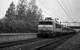 In de zomer van 1983 rijdt de NS 1657 nog zonder stadswapen (Rotterdam) door Delft Zuid met een IC richting Venlo.  In 1983 the NS 1657 is passing through Delft with a IC to Venlo. 