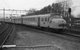 In 1983 passeren een Hondekop tweetje en een viertje Den Haag HS richting Vlissingen.  In 1983 two electric train units type Hondekop pass Den Haag HS on their way to Vlissingen. 