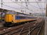 Op 26-2-2005 komt een Koploper viertje (nr 4234) uit Leeuwarden of Groningen Zwolle binnenrijden, om daar gekoppeld met de andere koploper verder te rijden richting Amersfoort.
13:46 On 26-2-2005 an electric train unit (NS Koploper 4234) is arriving in Zwolle, after a trip from Groningen or Leeuwarden. In Zwolle it will be coupled to another Koploper and together they wil leave in the direction of Amersfoort.
13:46