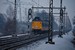 Een koploper rijdt door een besneeuwd landschap richting Zwolle bij De Herfte.
4-1-2010 om 13:32 A train unit (koploper) from NS is driving through a snowy Holland towards Zwolle at De Herfte. 
4-1-2010 - 13:32