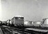 Rangeerlocomotief nr 8 van Shell rijdt met enkele ketelwagens over de sporen bij Pernis. 
1-3-1963
Beeldmateriaal Het Utrechts Archief Nr. 169622 Shunting locomotive nr 8 from Shell is working with some tank wagons on the tracks of Pernis (Rotterdam).
1-3-1963
Image from Het Utrechts Archief Nr. 169622
