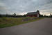 Eén van de gebouwen op het voormalig emplacement van Älvdalen met op de voorgrond de loswal.
27-7-2016 20:47 One of the buildings on the former yard of Älvdalen with the old loading platform. 
27-7-2016 20:47