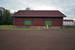 Eén van de gebouwen op het voormalig emplacement van Älvdalen.
27-7-2016 20:50 One of the buildings on the former yard of Älvdalen station. 
27-7-2016 20:50