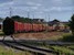 De losweg van Hässleholm met houtwagens op 24-6-2005 om 17:47. The team track of Hässleholm with wood wagons on 24-6-2005 at 17:47.