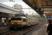 Op 18-11-2006 staat NS 1718 met een dubbeldekker aan een perron van Rotterdam Centraal. 
9:01  On 18-11-2006 an electric locomotive NS 1718 is pulling a double decker train beside the platform of Rotterdam C.S. 
9:01