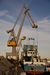 Een MAN kadekraan in de RMO in Rotterdam (Merwehaven) bij een overslagbedrijf.
18-11-2006 9:59 A MAN quay crane in RMO (Rotterdam) in the Merwehaven at a transshipment.
18-11-2006 9:59